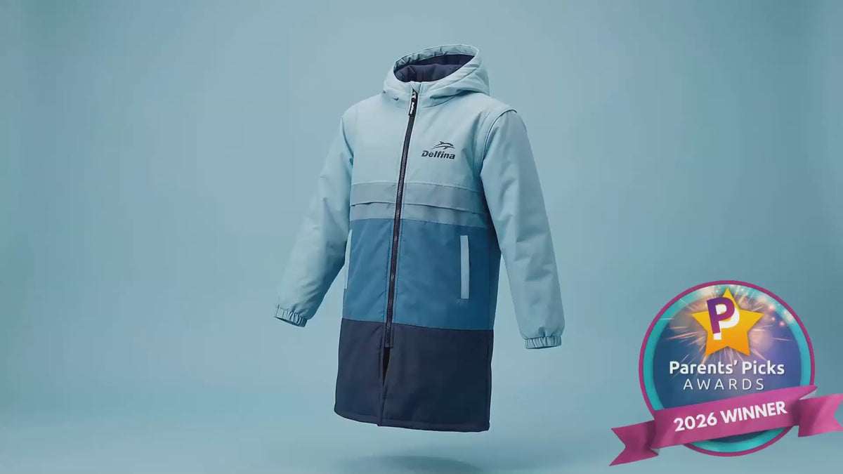 Load video: Delfina Athletics kids' swim parka with removable sleeves is the perfect item for any youth swimmer.